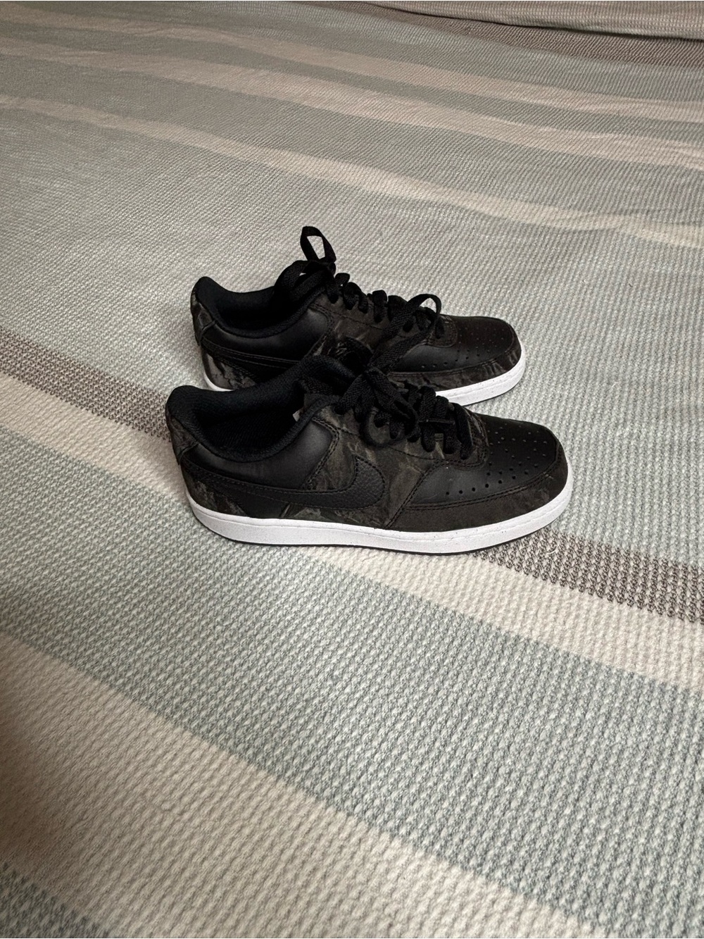 Women’s black velvet/suede Nikes size 6